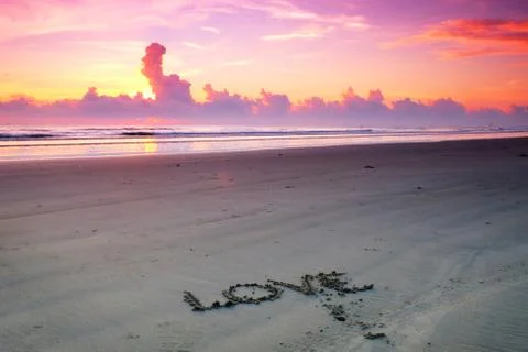 Sunrise at the beach Stock Photos