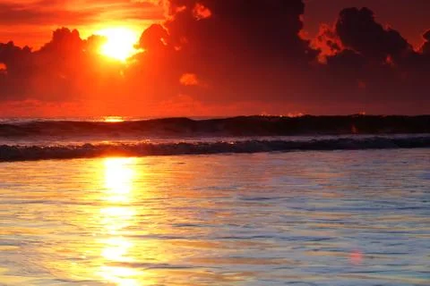 Sunrise at the beach Stock Photos
