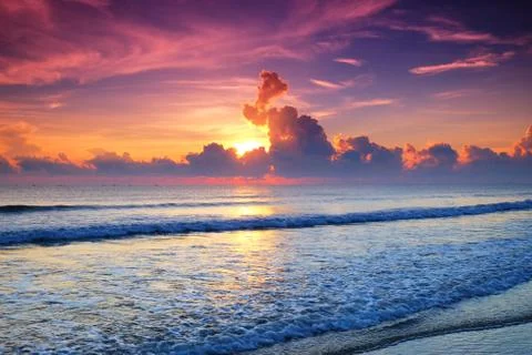Sunrise at the beach Stock Photos