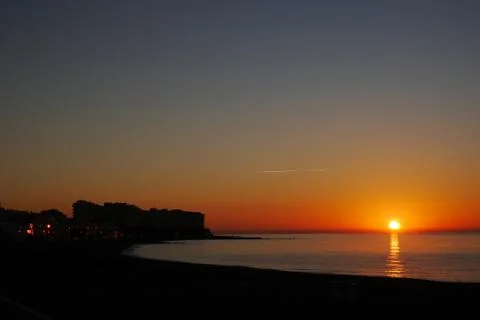 Sunrise in the beach Stock Photos