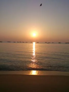 Sunrise beach Stock Photos