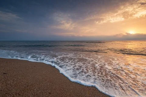 Sunrise at the beach. Stock Photos