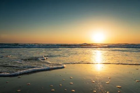 Sunrise at the beach. Stock Photos
