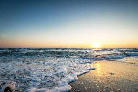 Sunrise at the beach. Stock Photos