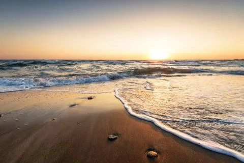 Sunrise at the beach. Stock Photos