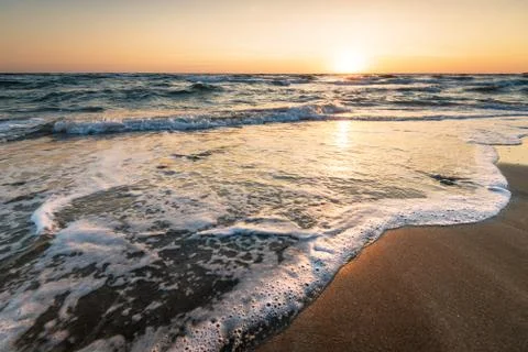 Sunrise at the beach. Stock Photos