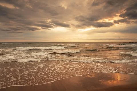 Sunrise at the beach. Stock Photos