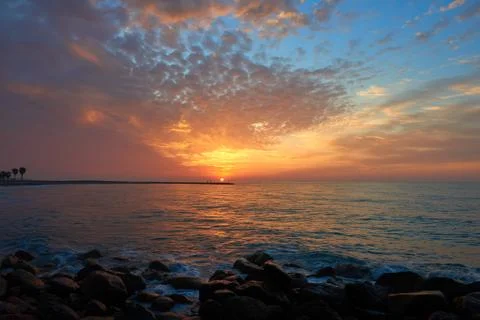 Sunrise on the beach Stock Photos