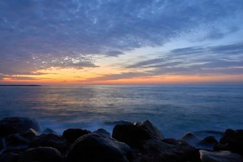 Sunrise on the beach Stock Photos