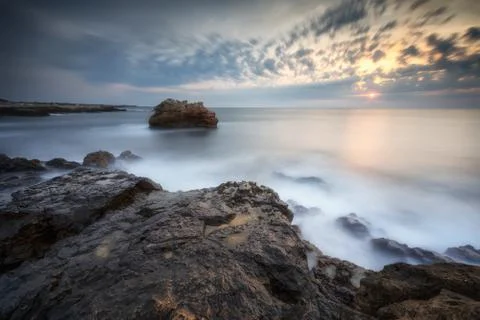 Sunrise on the beach Stock Photos