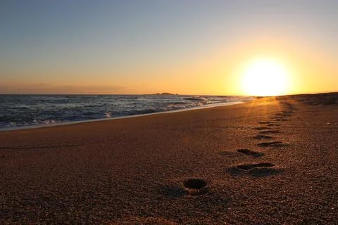 Sunrise at the beach Stock Photos