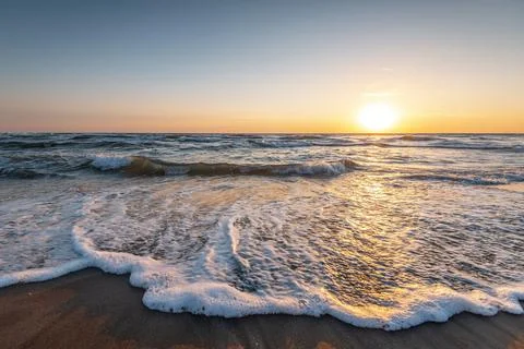 Sunrise at the beach. Stock Photos