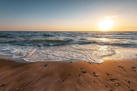 Sunrise at the beach. Stock Photos