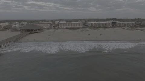 Sunrise Beach Pier Drone Pull D-Log 库存影片 90017402