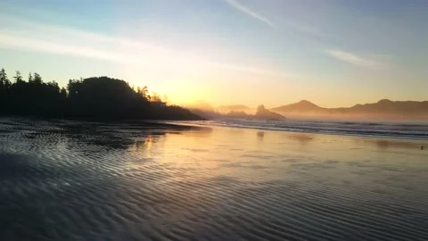Sunrise At The Beach Reflecting In The Sand  Video stock 168316996