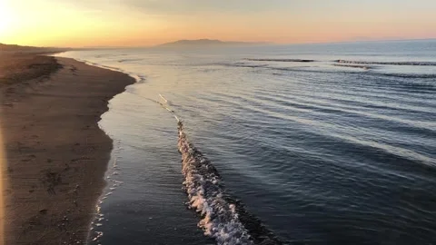 Sunrise on the beach shore Stock Footage 260916647