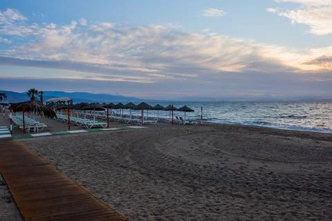 Sunrise on the beach with a sunbathing bed in Spain, Almeria Stock Photos