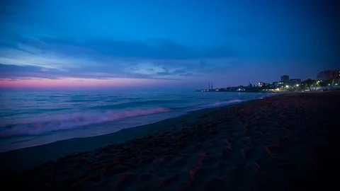 Sunrise. Beach. Time Lapse. Waves Coming and Going. Clouds Moving on Blue Sky. Stock Footage 71533730