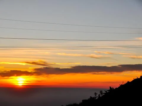 Sunrise behind the line. Stock Photos