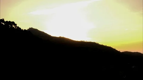 Sunrise behind the mountain Video stock 92962628