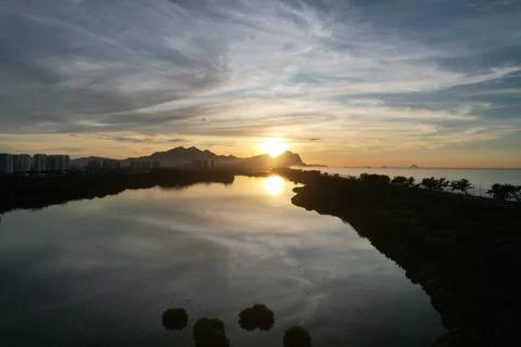 Sunrise  behind the mountains Stock Photos