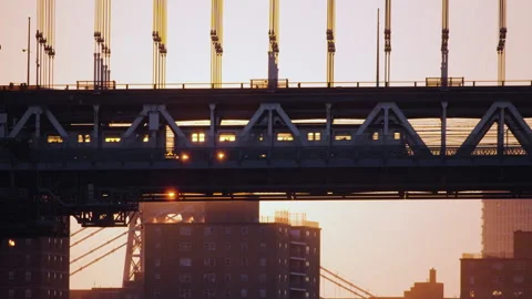 Sunrise behind Subway Train on Manhattan Bridge Video stock 247665959