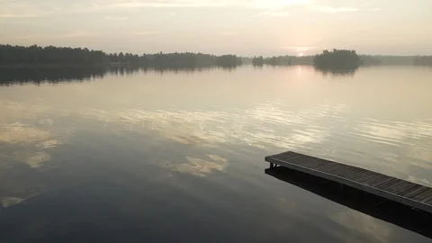 Sunrise being reflected in water. Stock Footage 95018768
