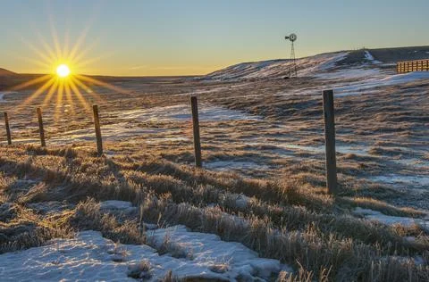 Sunrise on a Beiseker Windmill Stock Photos