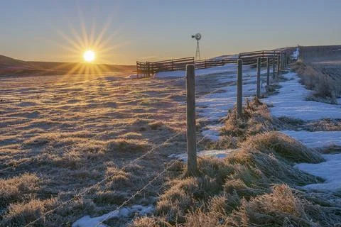 Sunrise on a Beiseker Windmill Stock Photos