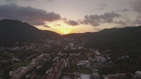 Sunrise Between The Hills In Kata, Phuket, Thailand, Ascending Aerial Drone Shot Video stock 80323850