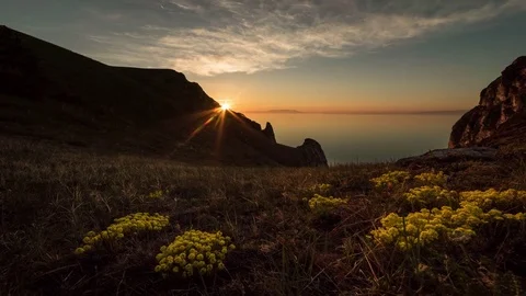 Sunrise on the big lake, clouds and mountains Stock Footage 76604752