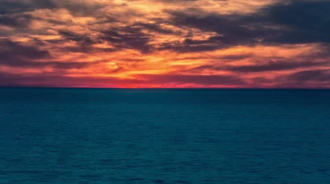 Sunrise Blue Ocean - Timelapse Sun Rising Orange Sky 4K - Time-Lapse over Water Stock Footage