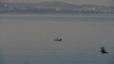 Sunrise boat in durres Stock Footage 313558461