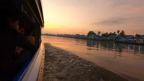 Sunrise in a boat Stock Footage 127510349