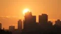 Sunrise, brazilian skyline. Silhouette buildings and golden sun. 1 HD Footage