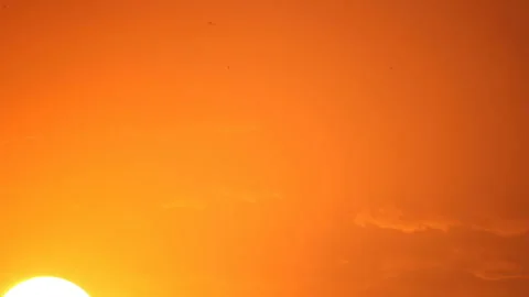 Sunrise on bright sky Stockbeeldmateriaal 86464275