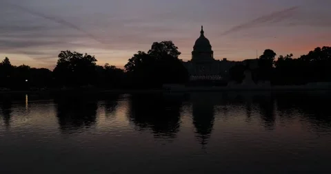 Sunrise at the Capitol building Stock Footage 136337234
