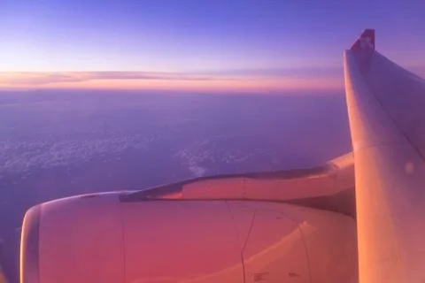 Sunrise Captured from Plane Window Foto stock
