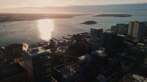 Sunrise casting a warm glow on Halifax's coastal scenery. Stock Footage 278928907
