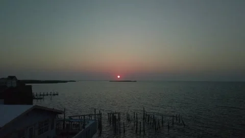 Sunrise Cedar Key Florida Fast Dock, Boats and wood Time lapse Stock Footage 243984134
