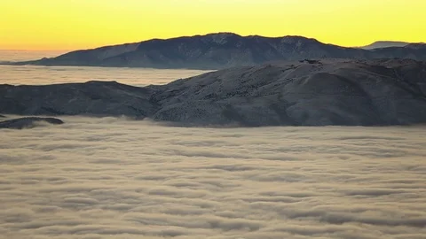 Sunrise Cloud Inversion over Winter Landscape near Reno Nevada Stock Footage 99532229