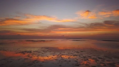 Sunrise cloud reflection Stock Footage 118684879