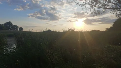 Sunrise clouds and lake Stock Footage 159228061