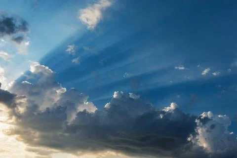Sunrise with clouds and light rays Stock Photos