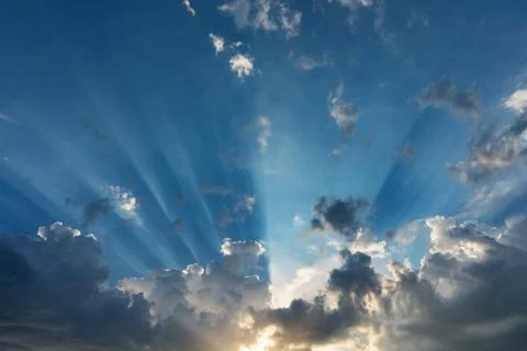 Sunrise with clouds and light rays Stock Photos