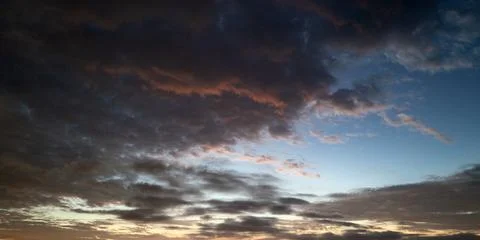 Sunrise Clouds background. Dramatic Clouds Sunset Background. Sky with clouds in Stock Photos