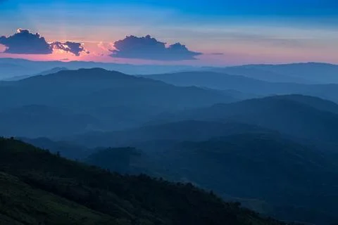 Sunrise with clouds, light and rays Stock Photos