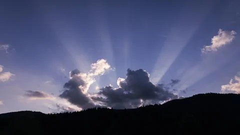 Sunrise in clouds in the mountains Stock Photos