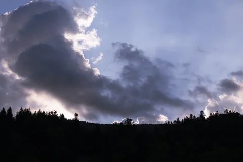 Sunrise in clouds in the mountains 스톡 사진