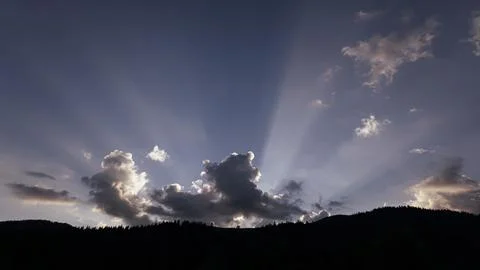 Sunrise in clouds in the mountains Fotos Stock